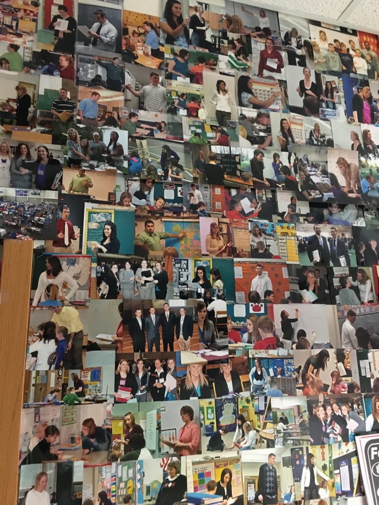 Tim Byers keeps a wall of pictures he’s taken of students in the classroom in his office. Photo by Hannah Conklin