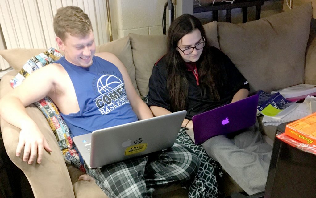 Horseback says she is grateful for the community and friends she has discovered at Bluffton. Here she works on homework alongside Jared Sleutz. Photo by Garrett Siefer