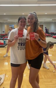 Emma Organ and Kelly Armentrout with their gift card prizes. Photo by Grace Fillinger.